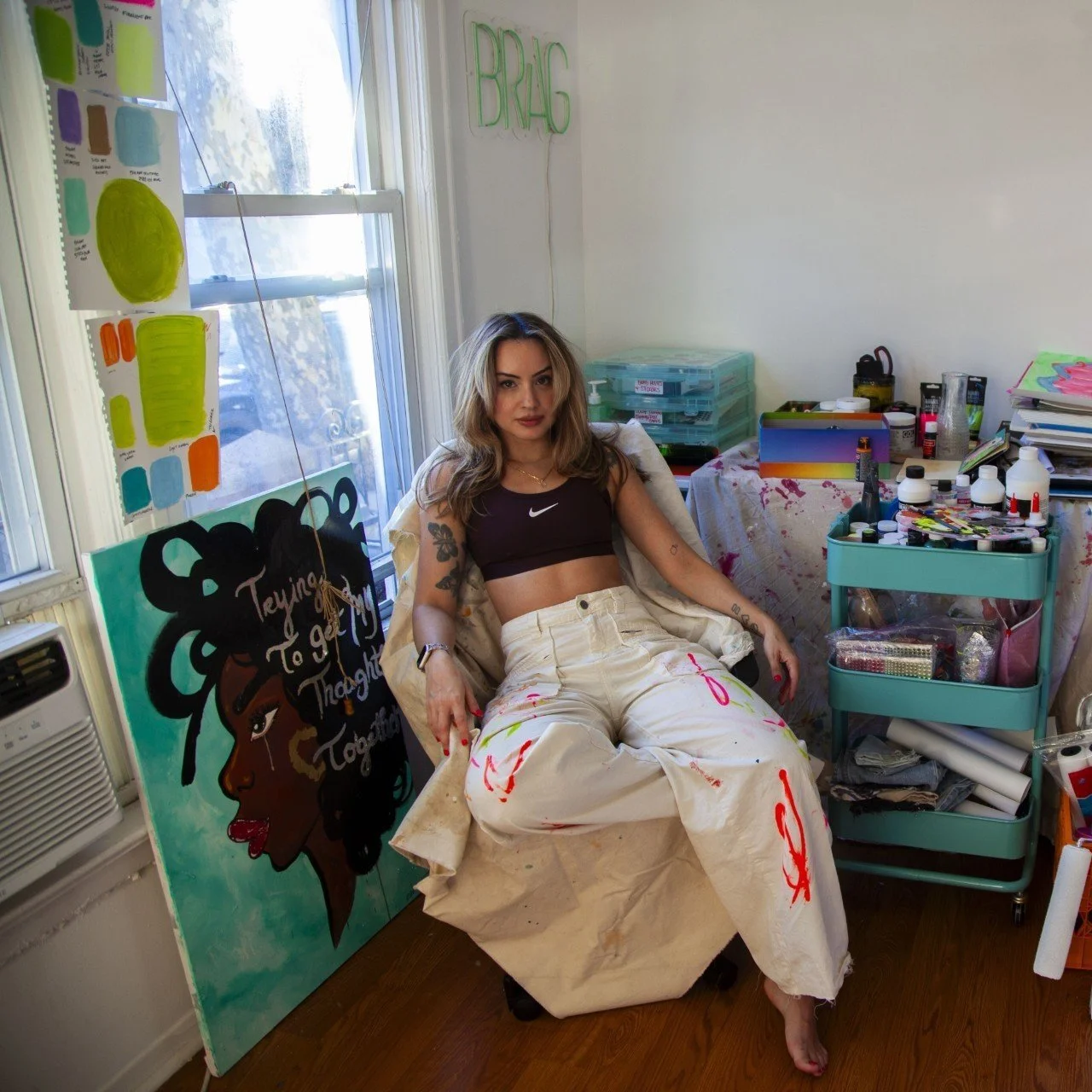 portrait of artist Mariya Brag in their studio